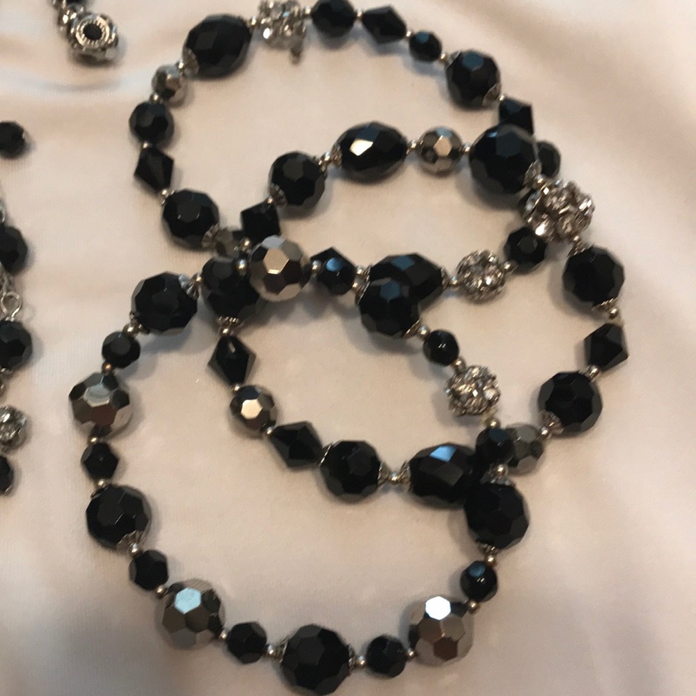 2 earrings. 3 bracelets. 1 necklace.